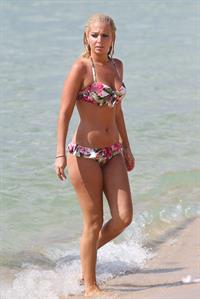 Tulisa Contostavlos in a bikini on the beach in Honolulu July 31, 2012