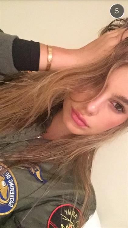 Camila Morrone taking a selfie