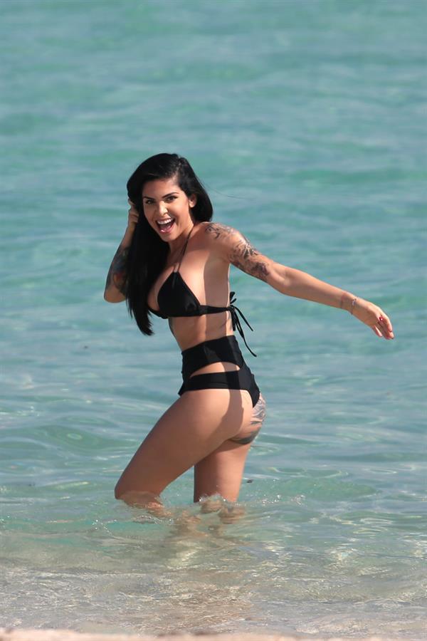 Cami Li in a bikini - ass