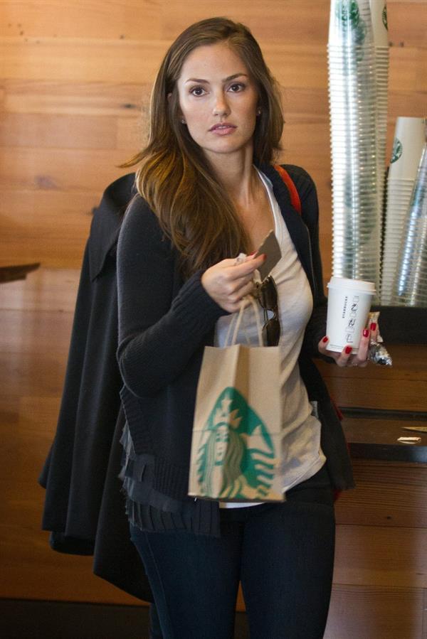 Minka Kelly outside her hotel with her morning Starbucks in New York City 8/2/2012 