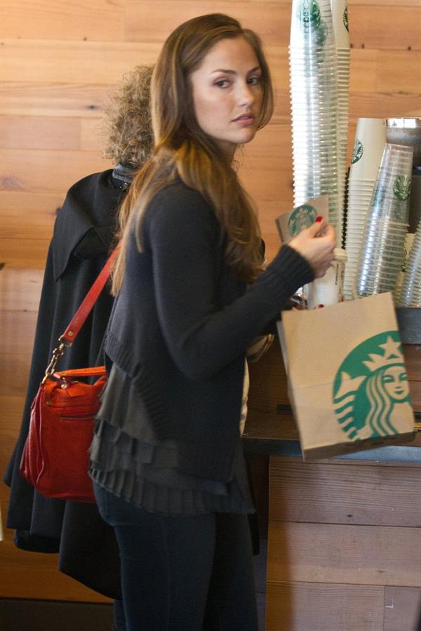 Minka Kelly outside her hotel with her morning Starbucks in New York City 8/2/2012 