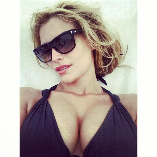 Tatyana Kotova in a bikini taking a selfie