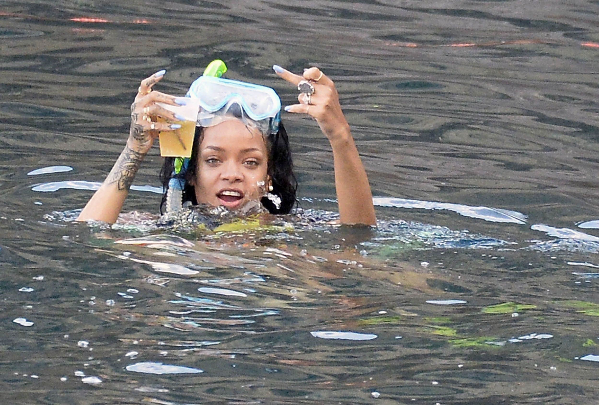 Rihanna enjoying a break on a yacht in Ponza August 29, 2014