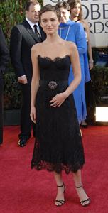 Natalie Portman with short hair and a black dress at the Golden Global Awards