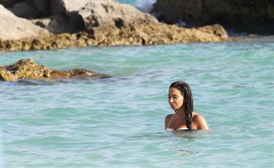 Tulisa Contostavlos in a bikini on the beach in Bermuda August 21, 2014