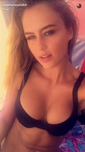 Stephanie Claire Smith in a bikini taking a selfie