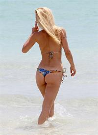 Michelle Hunziker in a bikini - ass