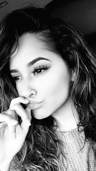 Becky G taking a selfie