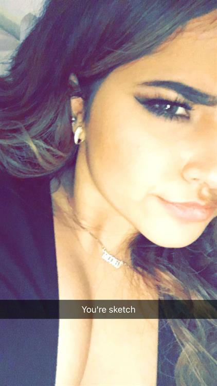 Becky G taking a selfie
