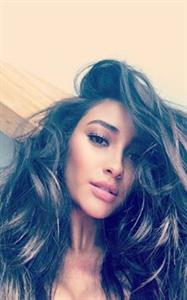Shay Mitchell taking a selfie
