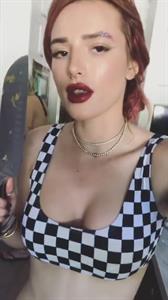 Bella Thorne in a bikini taking a selfie