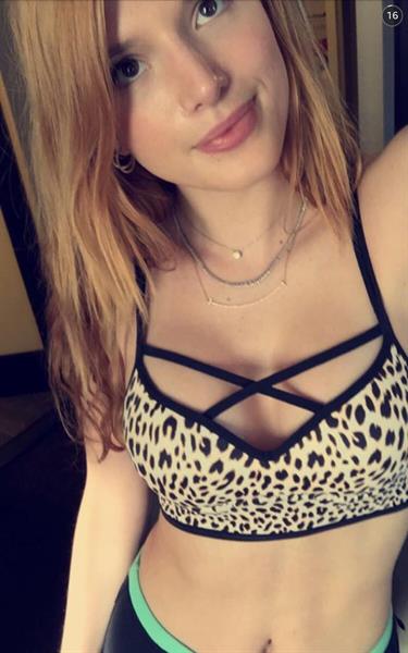 Bella Thorne in a bikini taking a selfie