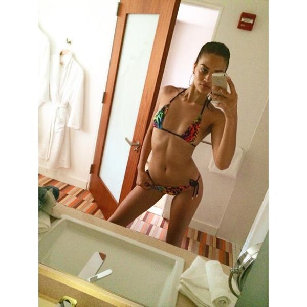 Shanina Shaik in a bikini taking a selfie