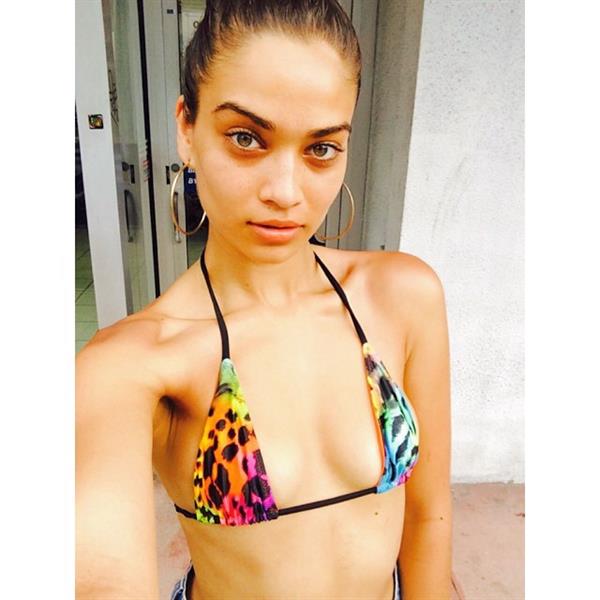 Shanina Shaik in a bikini taking a selfie