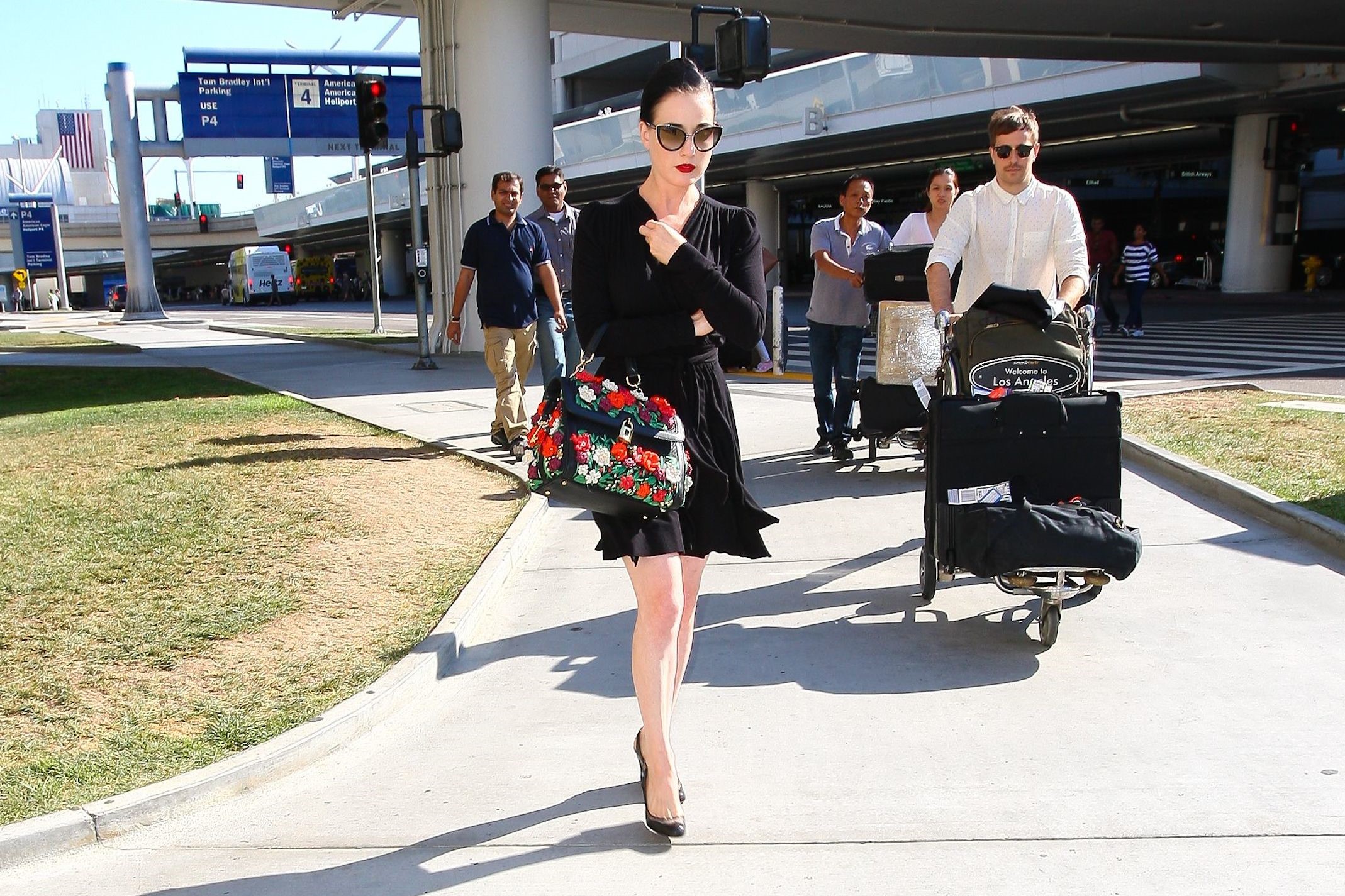 Dita Von Teese arrives from a flight at LAX August 20, 2014