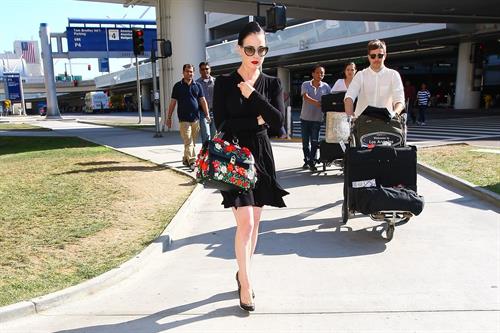 Dita Von Teese arrives from a flight at LAX August 20, 2014