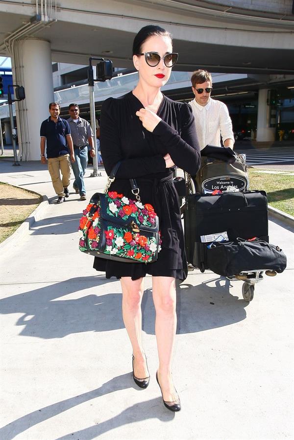 Dita Von Teese arrives from a flight at LAX August 20, 2014