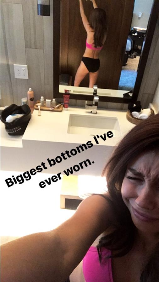 Sarah Hyland in a bikini taking a selfie