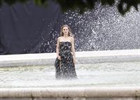 Natalie Portman modeling for a Miss Dior campaign photo shoot in the gardens of the Palais Royal in Paris 6/26/12 