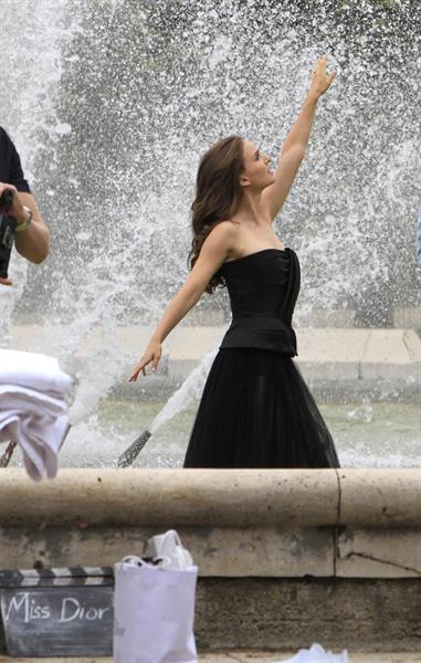 Natalie Portman modeling for a Miss Dior campaign photo shoot in the gardens of the Palais Royal in Paris 6/26/12 