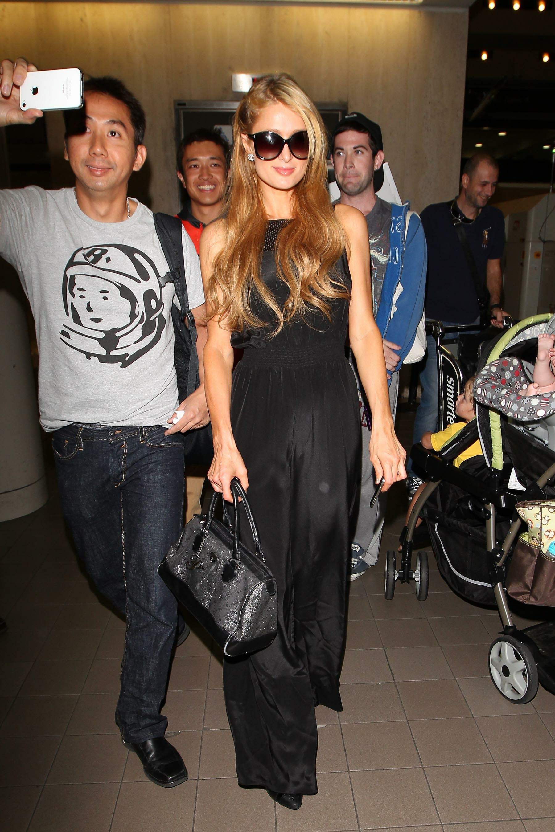 Paris Hilton arrive at LAX Airport 9/30/13