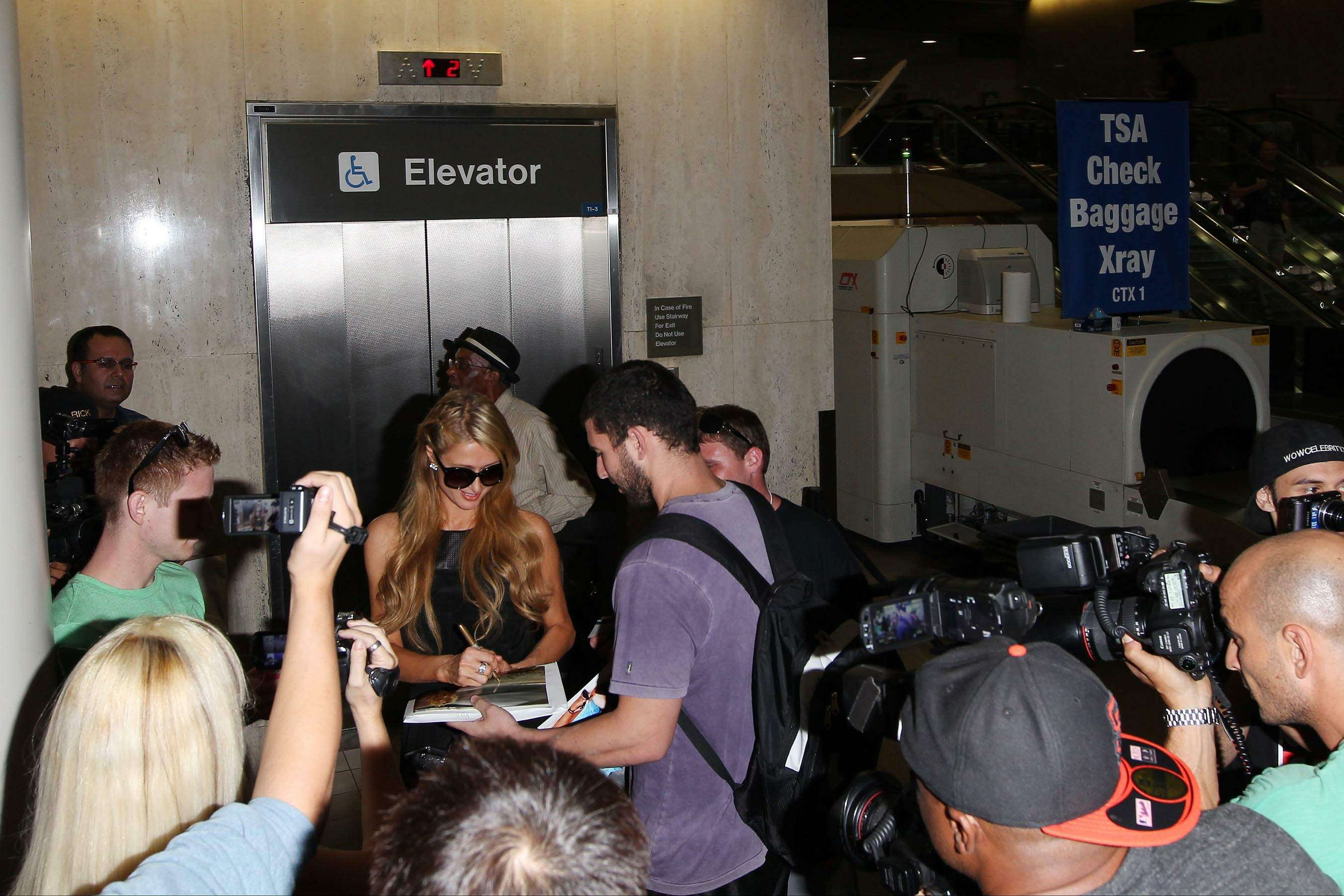 Paris Hilton arrive at LAX Airport 9/30/13