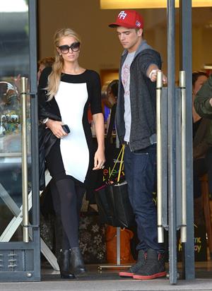 Paris Hilton and Her Boyfriend River Viiperi Shop at Barneys New York on December 15, 2012 