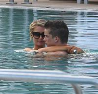 Paris Hilton spends the day in and out of the pool in Miami December 8, 2012