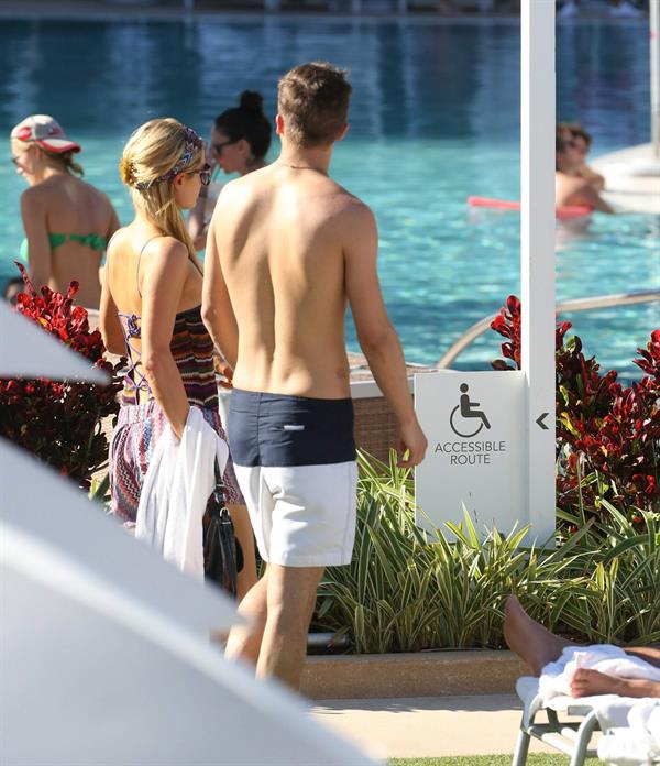 Paris Hilton poolside at their Miami hotel December 7-2012 