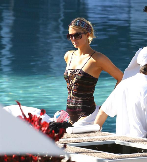 Paris Hilton poolside at their Miami hotel December 7-2012 