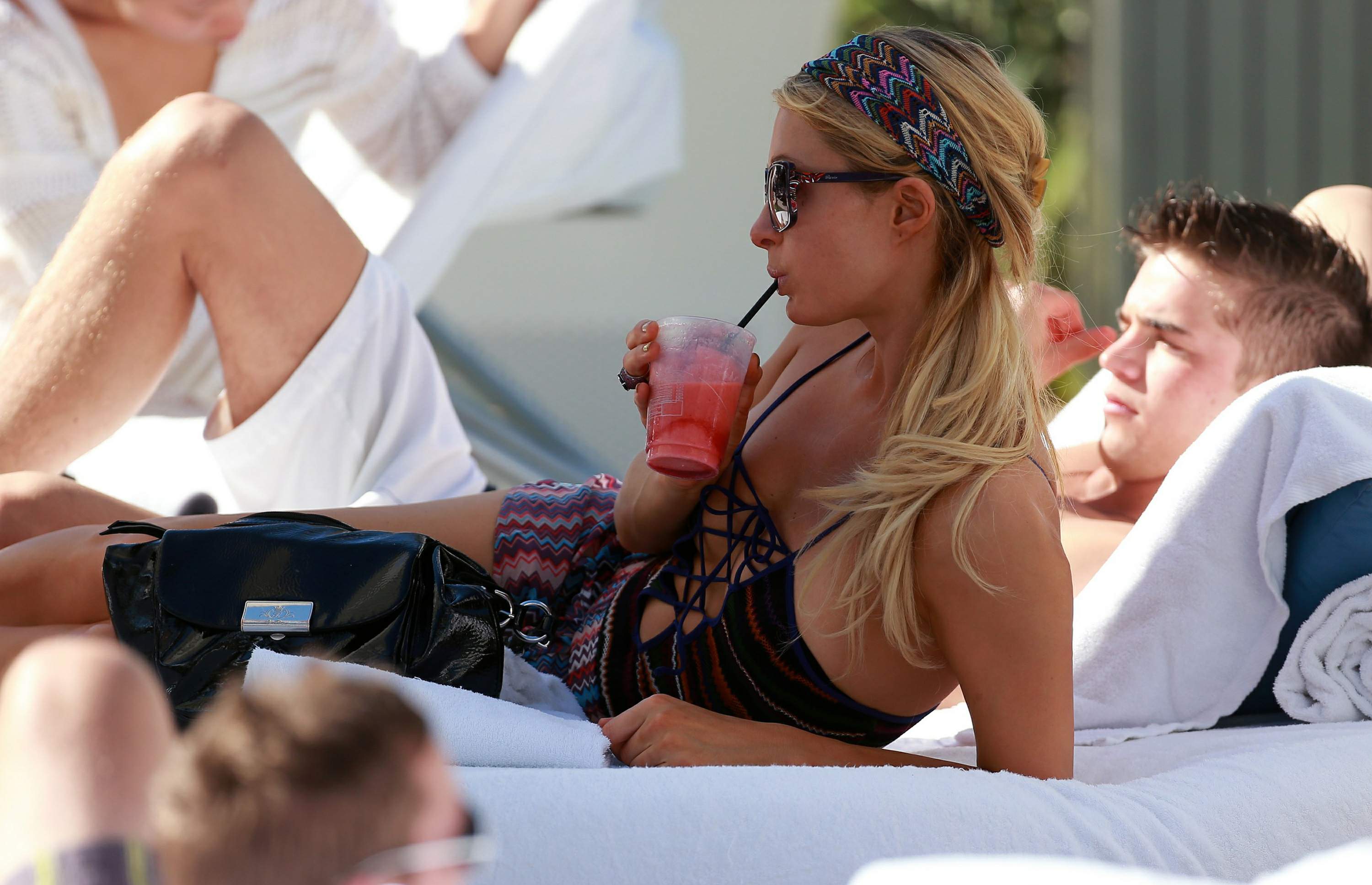 Paris Hilton poolside at their Miami hotel December 7-2012 