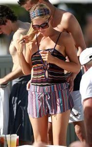 Paris Hilton poolside at their Miami hotel December 7-2012 