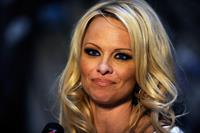 Pamela Anderson - Arrives at Simon G. Jewelry's Summer Soiree and the kickoff of Carnevale Night - June 2, 2012