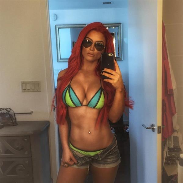 Natalie Eva Marie in a bikini taking a selfie