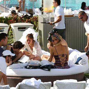 Paris Hilton poolside at their Miami hotel December 7-2012 