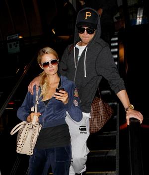 Paris Hilton and River Viiperi holding hands at LA. December 10, 2012 