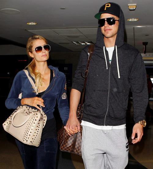 Paris Hilton and River Viiperi holding hands at LA. December 10, 2012 