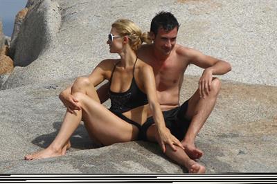 Paris Hilton - Wearing a swimsuit at a beach in France August 6, 2012