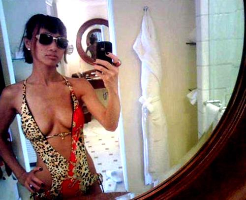 Bai Ling in a bikini taking a selfie