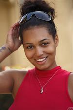 Noelle Monique Cutie Ebony in a red top