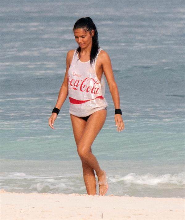 Adriana Lima – beach shoot candids in Cancun 12/2/13 