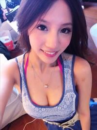 Lin Cai Ti taking a selfie