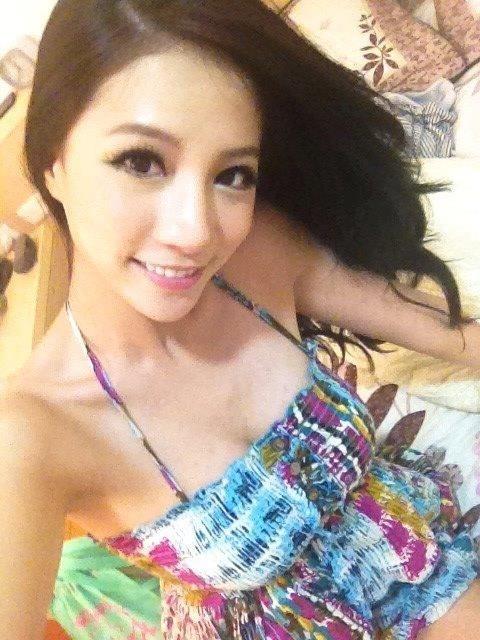 Lin Cai Ti taking a selfie
