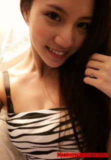 Lin Cai Ti taking a selfie