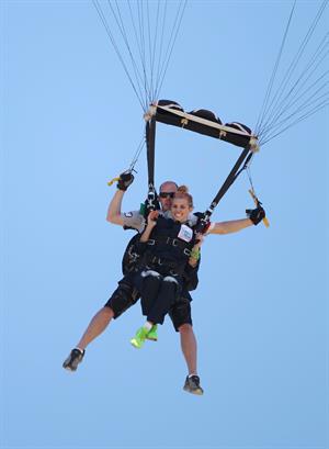 AnnaLynne McCord skydives from 18,000 feet at a charity event, Lompoc August 16, 2014