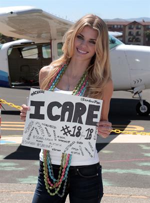 AnnaLynne McCord skydives from 18,000 feet at a charity event, Lompoc August 16, 2014
