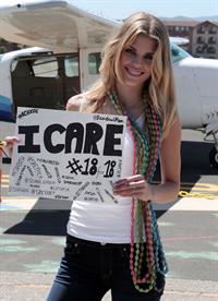 AnnaLynne McCord skydives from 18,000 feet at a charity event, Lompoc August 16, 2014