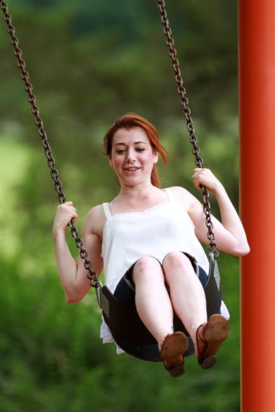 Alyson Hannigan playing in a park in Atlanta July 28, 2011 