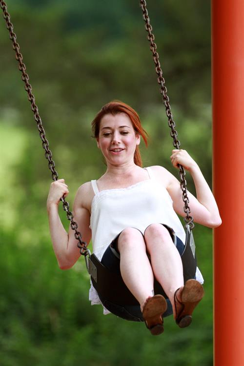 Alyson Hannigan playing in a park in Atlanta July 28, 2011 