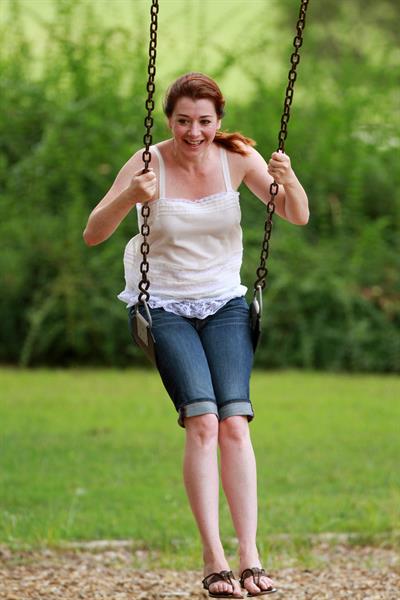 Alyson Hannigan playing in a park in Atlanta July 28, 2011 